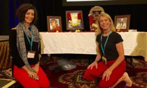 In front of Guruji's alter in the practice hall.